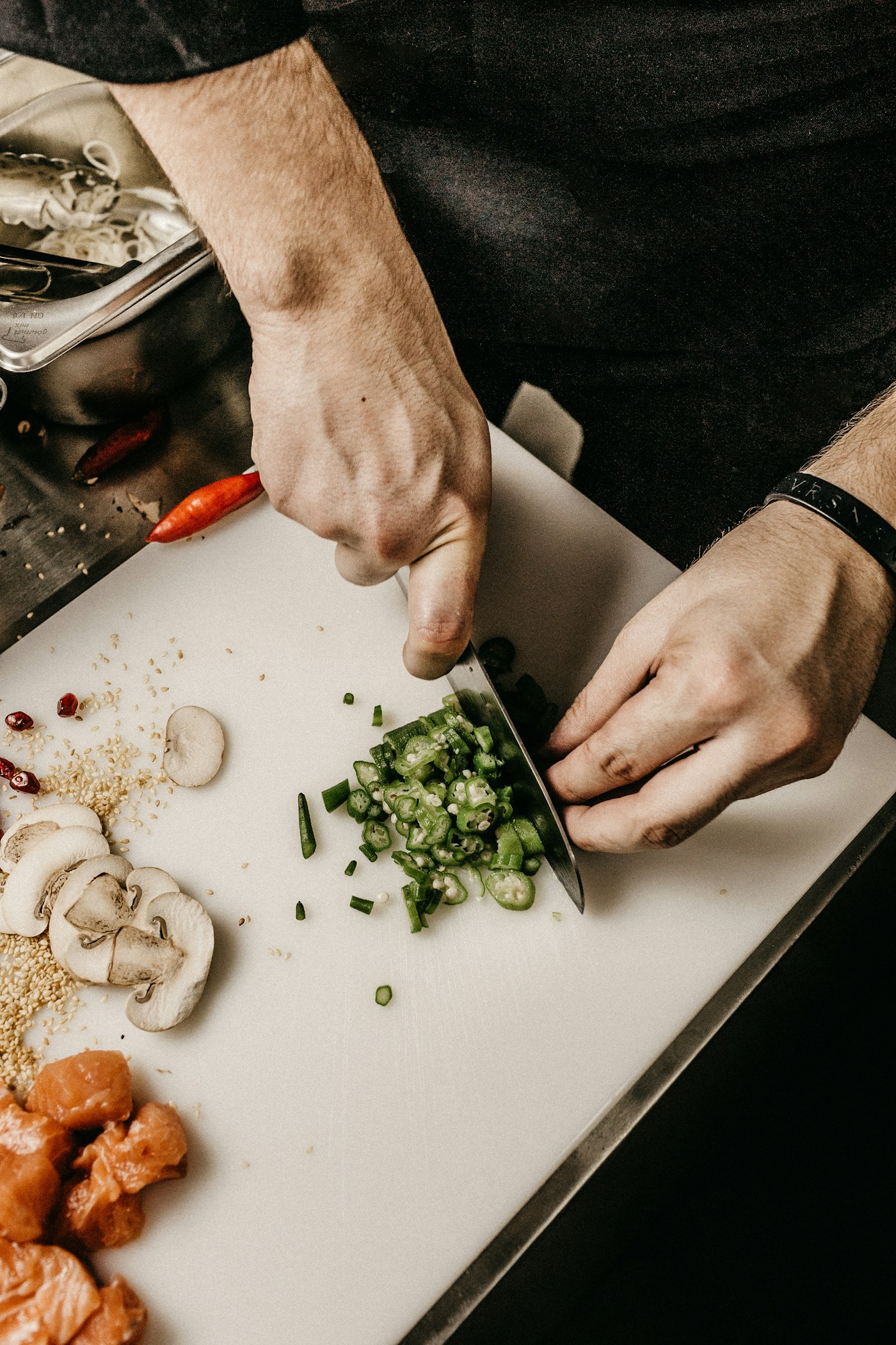 A chef preparing fresh ingredients in a kitchen